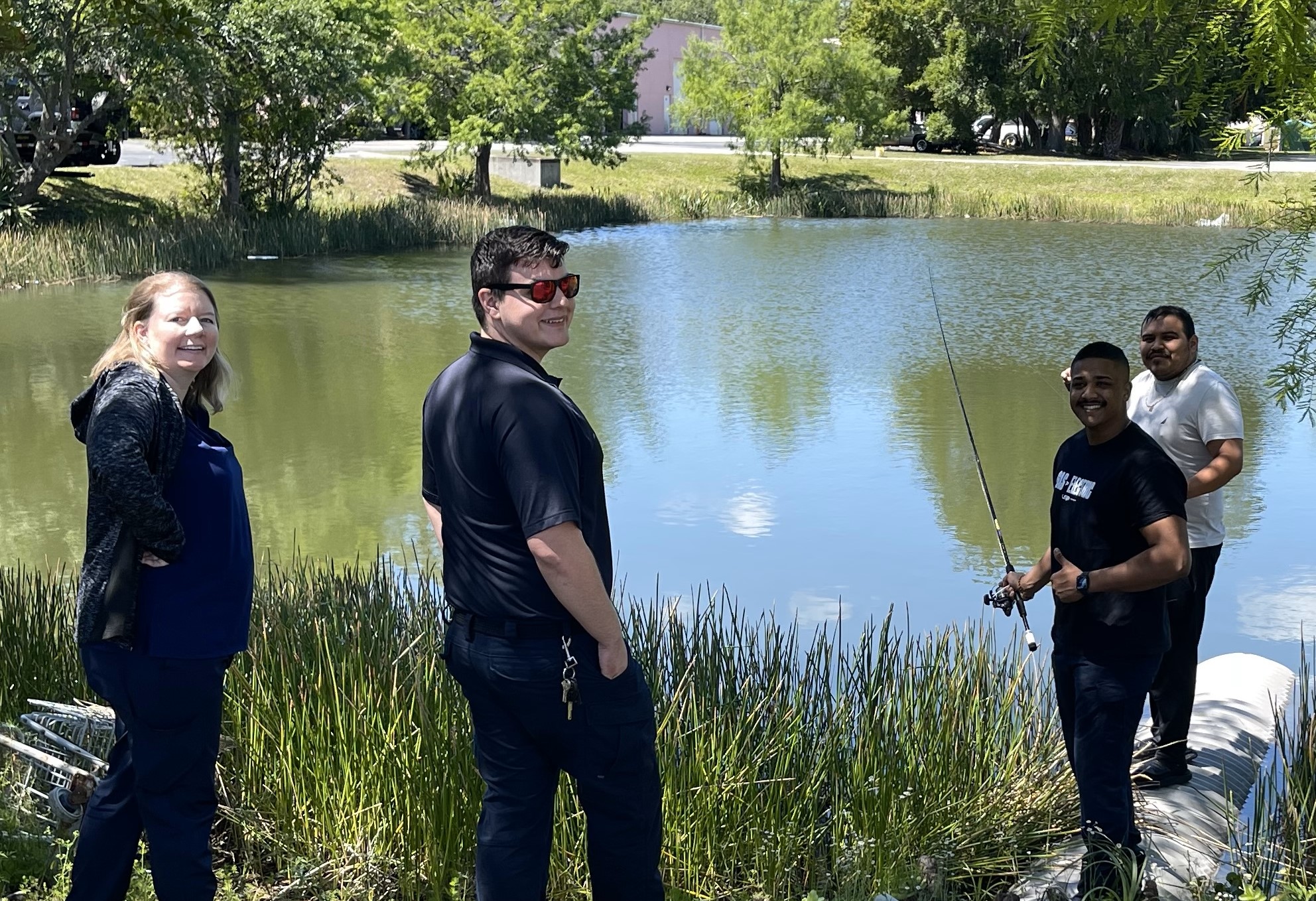 Dispatcher Mandy, Paramedic Peirce, EMT Jason, EMT Orby do a little fishing at the new Treasure Coast station.